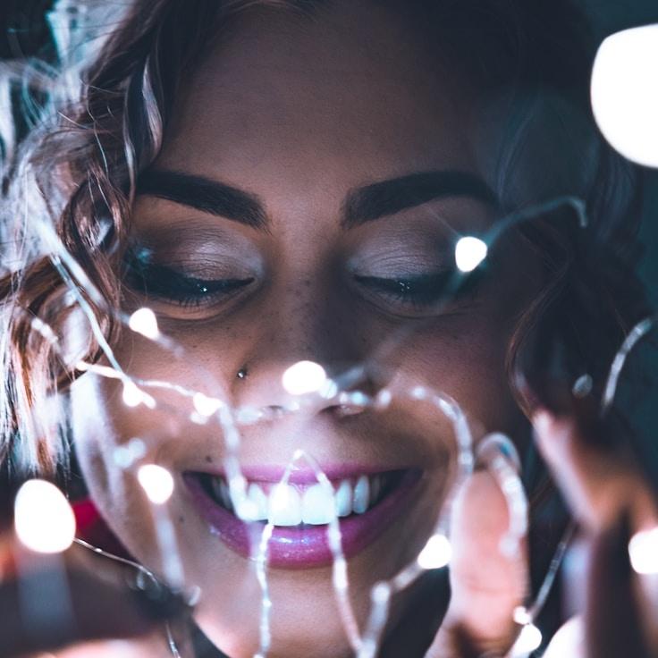 Mira Kapoor, Client Relations Director, discussing corporate gifting strategy with business clients