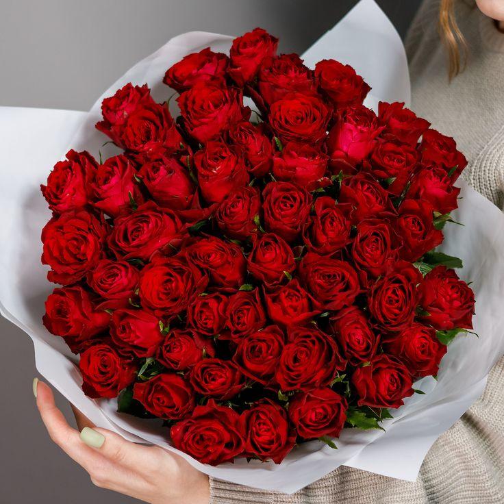 Professional floral arrangement in modern corporate setting